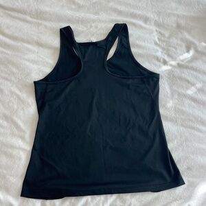 Two XL compression tank tops (fit like a normal medium)